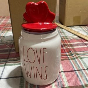 “ love wins” canister